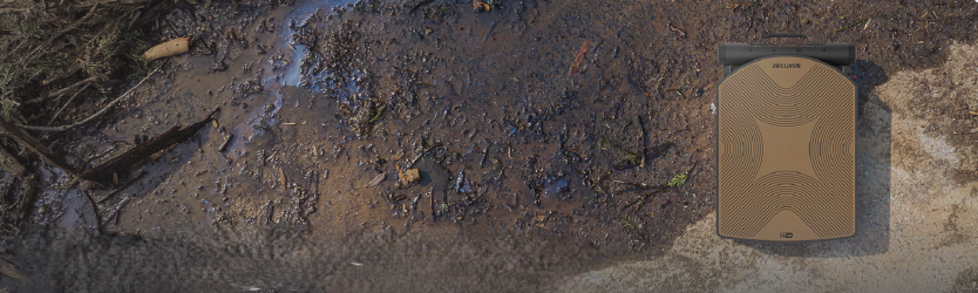 A detailed close-up image of a Mavic 2 drone flying outdoors in daylight.